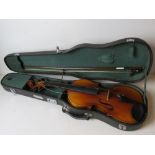 A Chinese violin Skylark Grand in case.