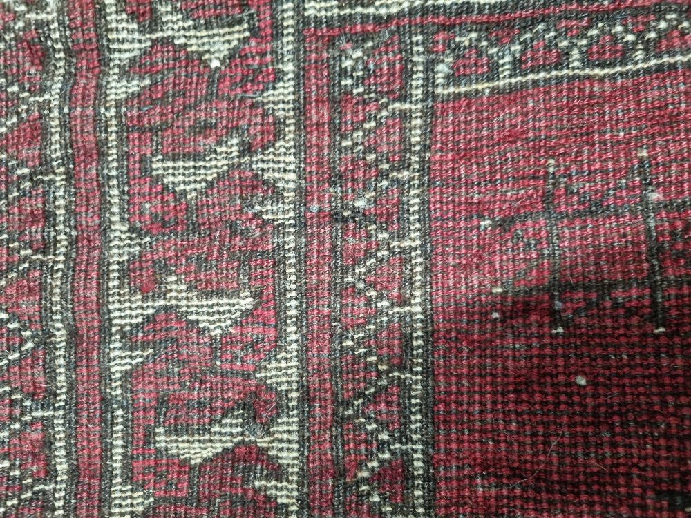 A red ground prayer mat measuring approx. 113 x 86cm. - Image 2 of 2