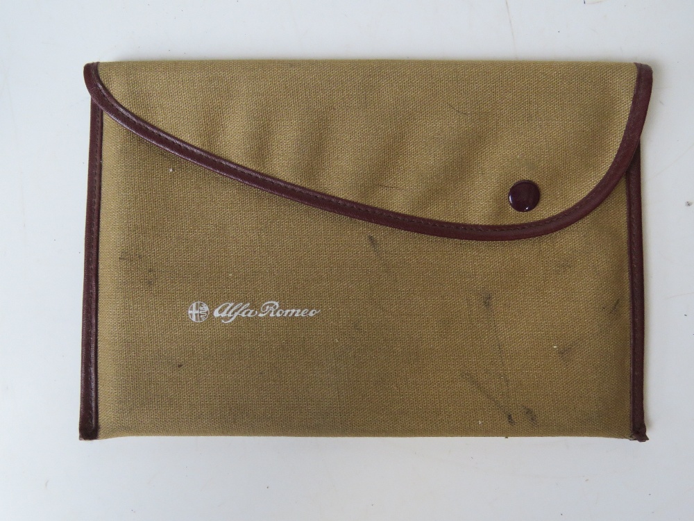 An Alfa Romeo 90 2.5 handbook in original cloth pouch. - Image 2 of 2