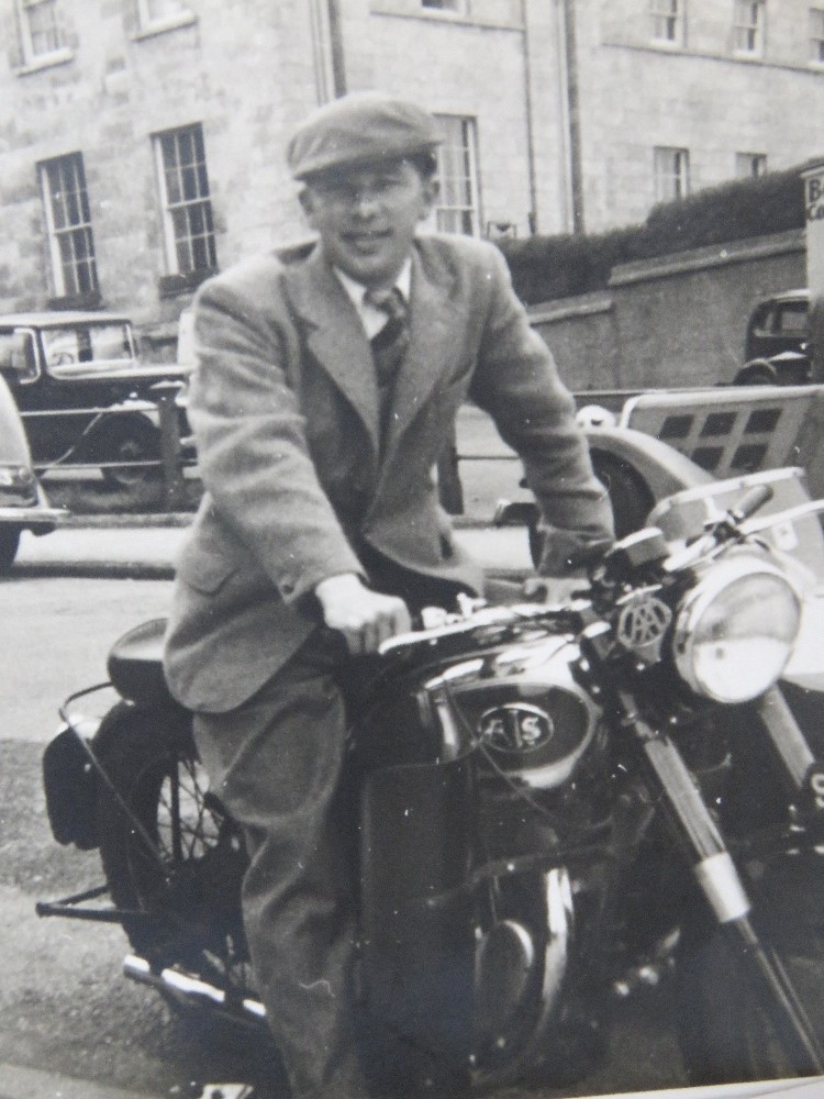 A photo of Stan Rodwell (of Stanley Phelps motorbike and parts shippers) on an AJS motorbike, - Image 2 of 3