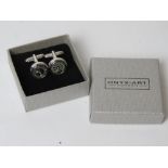 A pair of as new cufflinks in the form of dashboard dials by Onyx-Art in presentation box.