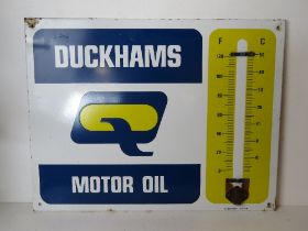 A printed metal Duckhams Motor Oil sign, thermostat deficient, measuring approx 65.5 x 51cm.