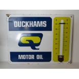 A printed metal Duckhams Motor Oil sign, thermostat deficient, measuring approx 65.5 x 51cm.