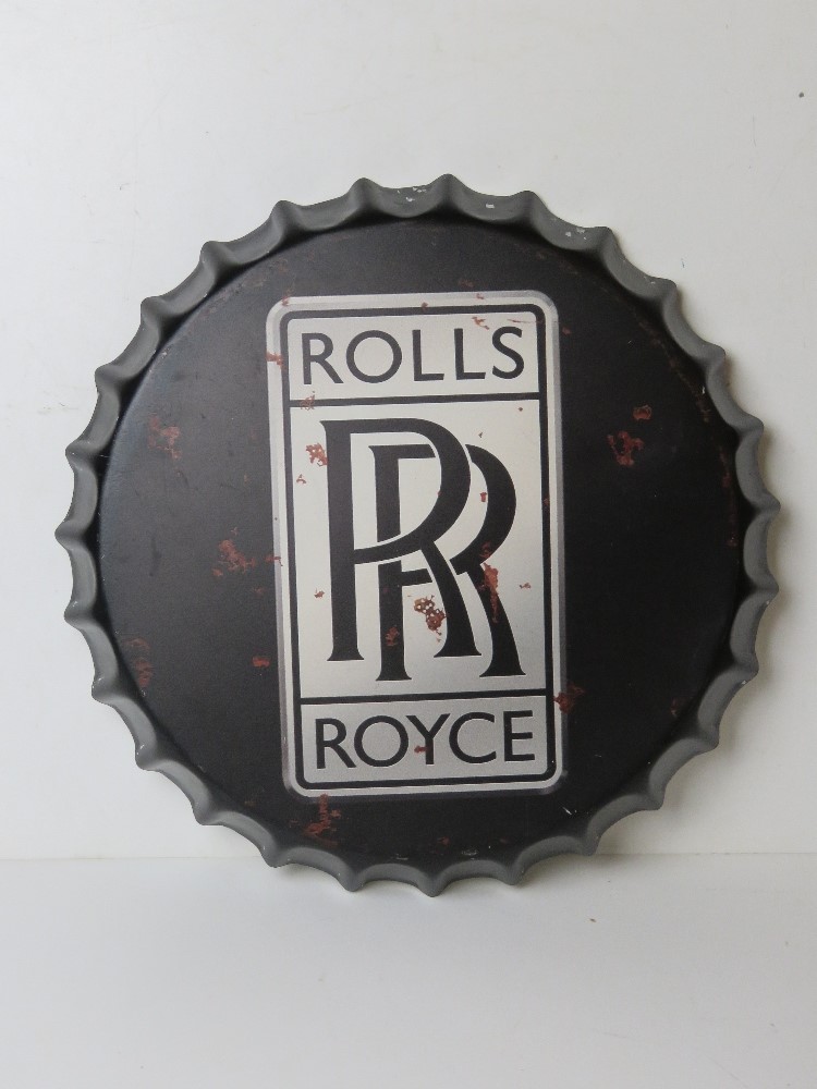 A contemporary Rolls Royce garage sign in the form of a bottle top approx 42cm dia.