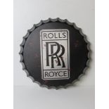 A contemporary Rolls Royce garage sign in the form of a bottle top approx 42cm dia.