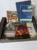 A quantity of assorted vehicle parts catalogues and automotive magazines.