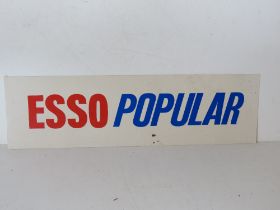 A printed plastic Esso Popular sign measuring approx 57.5cm wide.