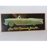 A contemporary metal sign 'The 1957 Chevrolet Bel Air' approx 56cm wide.