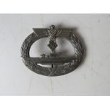 A WWII German 'silver' Submarine badge marked FO to back.