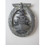 A WWII German Battle Cruiser badge, clasp a/f marked to back FEC ADOLF BOCK AUSF SCHWERIN Berlin.