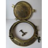A large and impressive solid brass ships porthole with cover, glass deficient, approx 53cm dia, 32.