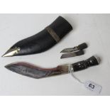 A Gurkha Kukri knife with scabbard, with the Karda and Chakmak blades,