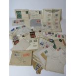 A quantity of 1930s German postcards, stamped envelopes and other items of philatelic interests.