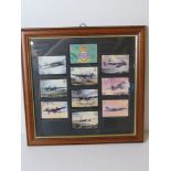 A framed set of Military themed 'Famous Bombers' cigarette cards.