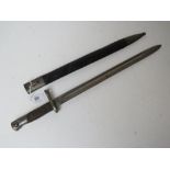 A WWII Brazilian Mauser model 1935 bayonet and scabbard, with serial number 37677 on the blade.