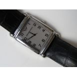 A mens Emporio Armani wrist watch on leather strap,