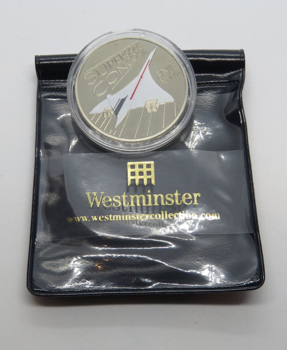A Westminster commemorative Supersonic Concorde £52009 coin, in proof pod, no cert.