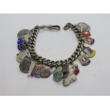 A HM silver watch guard chain converted for use as a charm bracelet,