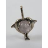 A dolphin and rose quartz pendant, 3cm in length.