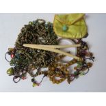 A quantity of assorted costume jewellery inc glass bead boho style necklaces, hard stone necklace,