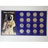 A complete collection of 'Man in Flight' commemorative coins produced by Shell.