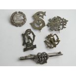 A HM silver monogram brooch, together with two silver monogram brooches,