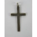 A silver crucifix pendant having scrolling engraving to front, stamped sterling, 3.