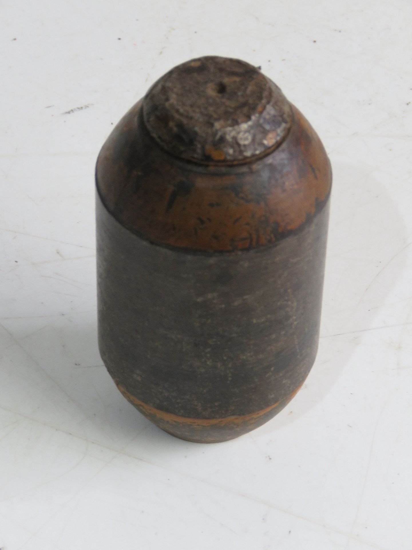 An inert WWII Belgian DBT mortar projectile, with original paint, cap unscrews.