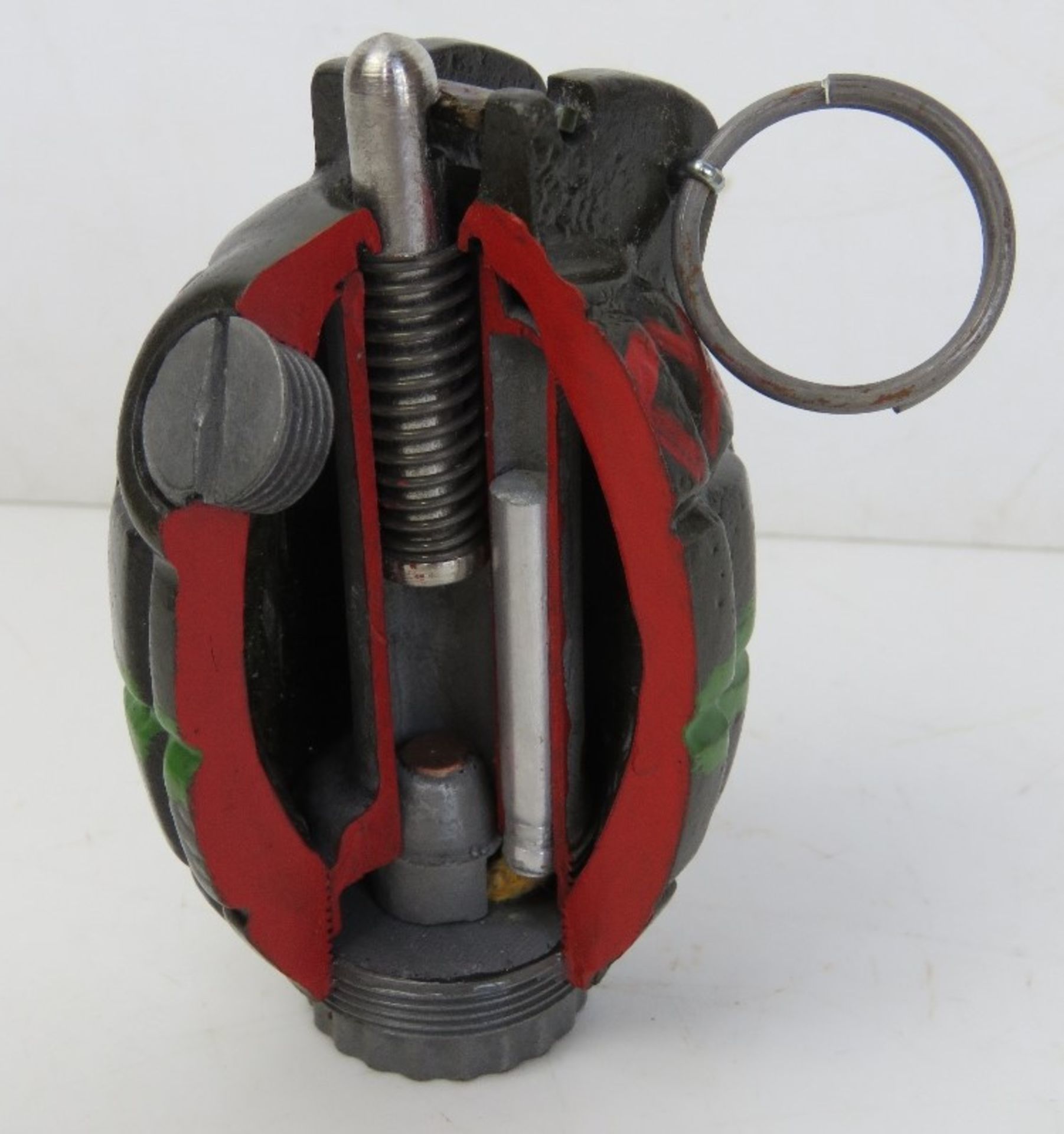 An inert resin No.36 Mills cutaway grenade. - Image 2 of 4