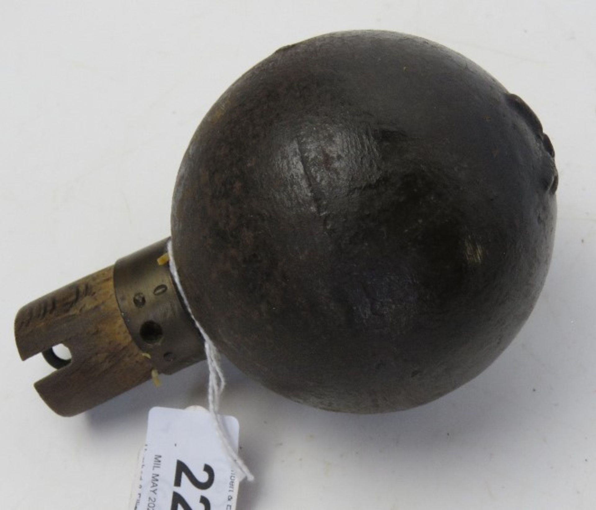 An inert WWI French Model 1915 ball grenade, bears markings RTF on the base.