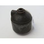 An inert WWI Ink Pot German grenade, bearing T.R markings on top, comes apart.