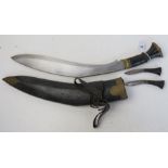 A Gurkha Kukri knife with scabbard, with the Karda and Chakmak blades, with belt loops.