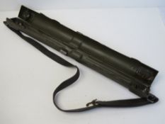 A WWII German MG42 spare barrel case with leather strap, makers jvo and dated 1942,