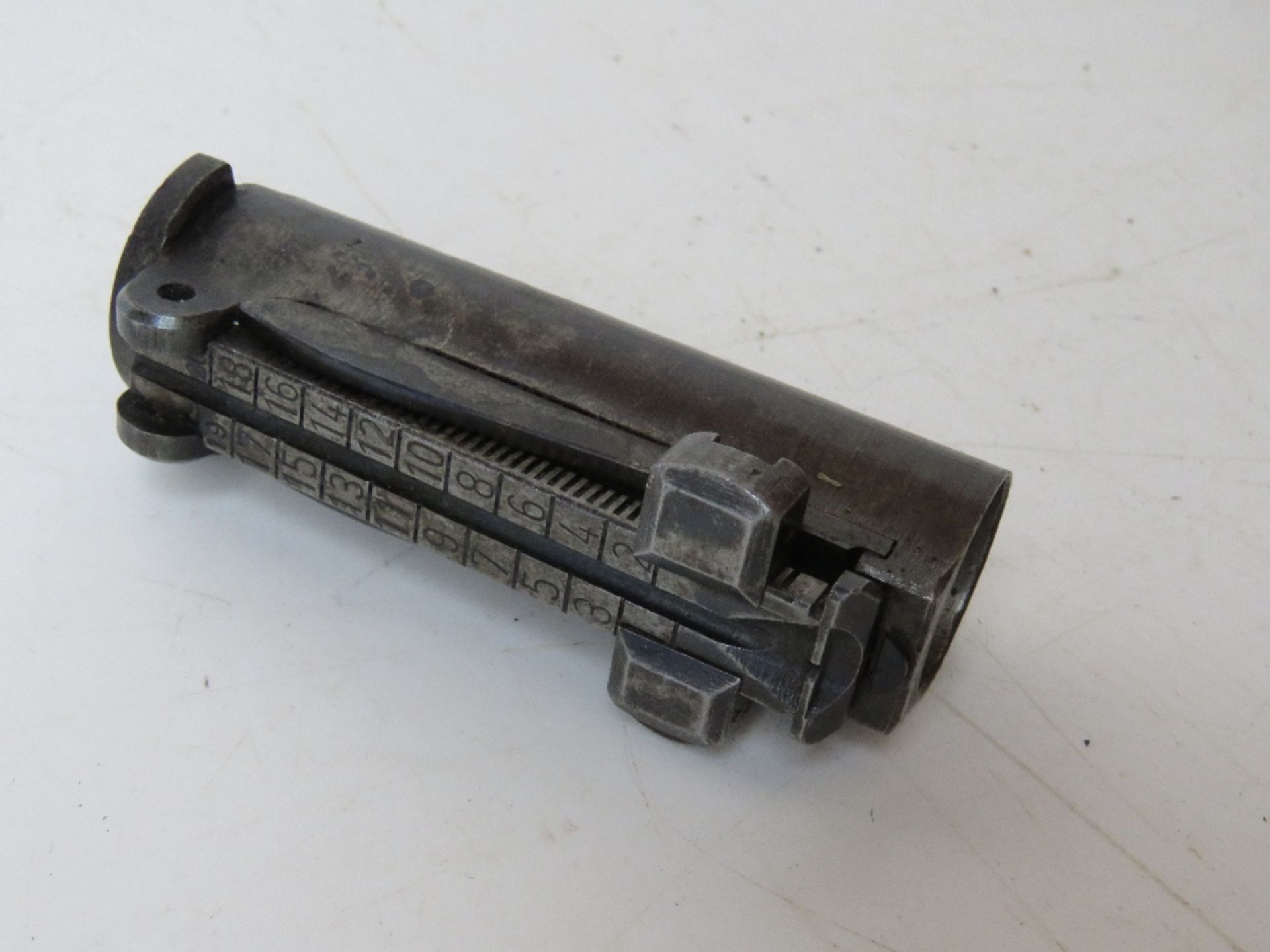 A WWII German Mauser K98 rear sight.