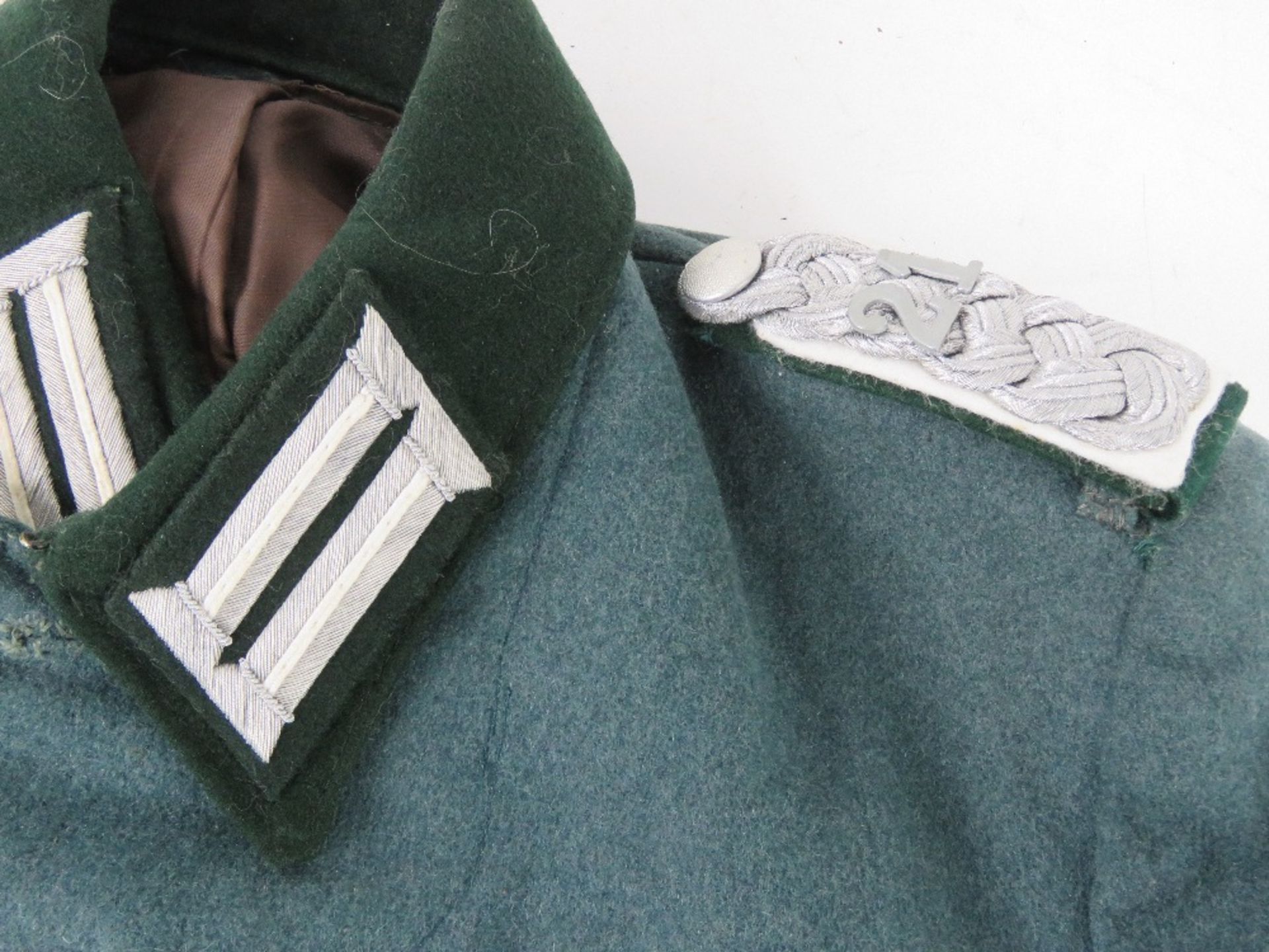 A reproduction German Combat Jacket with Insignia, and breeches. - Image 4 of 6