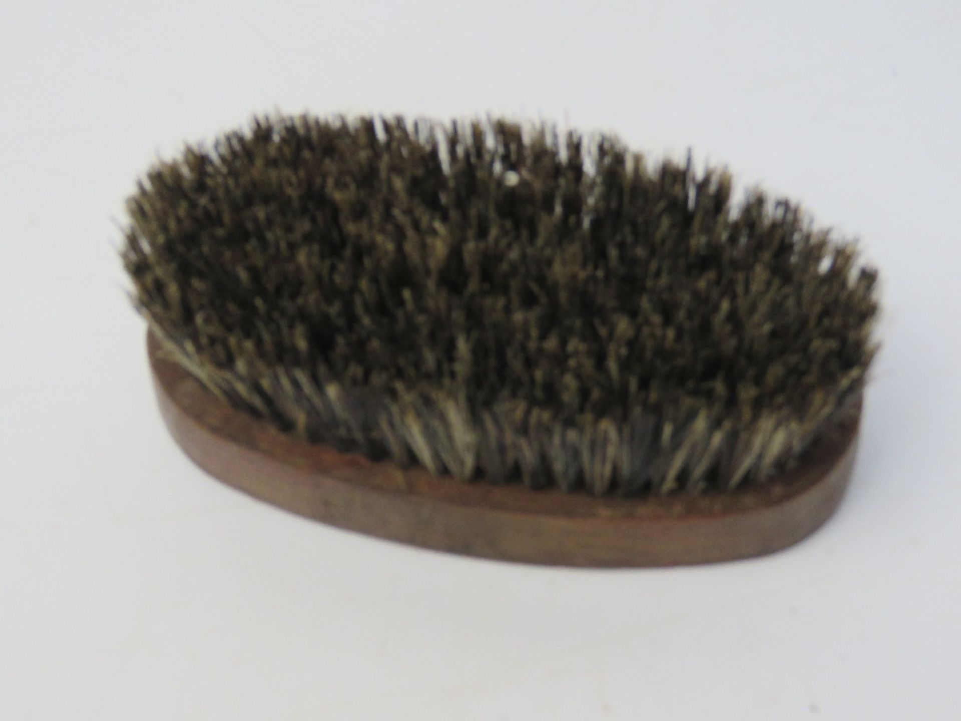 A WWII E&E (Escape & Evasion) boot brush with saw. Compass within. - Image 2 of 3