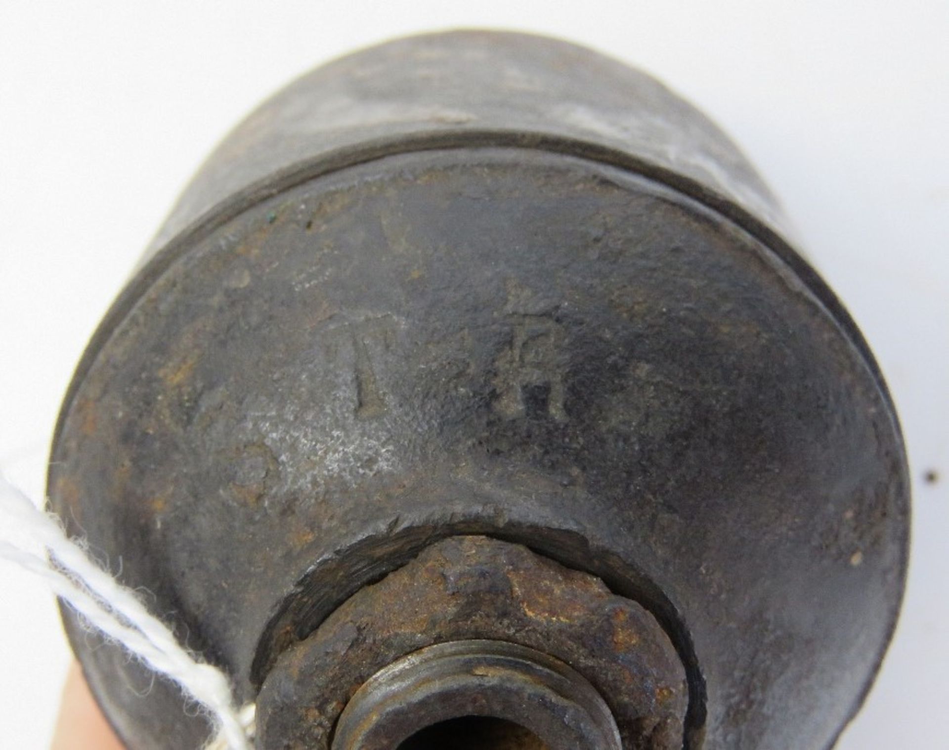 An inert WWI Ink Pot German grenade, bearing T.R markings on top, comes apart. - Image 3 of 3