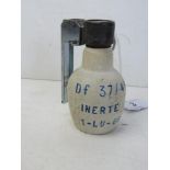 An inert French 1968 defensive grenade, dated 1968, with fuse, spoon and pin,