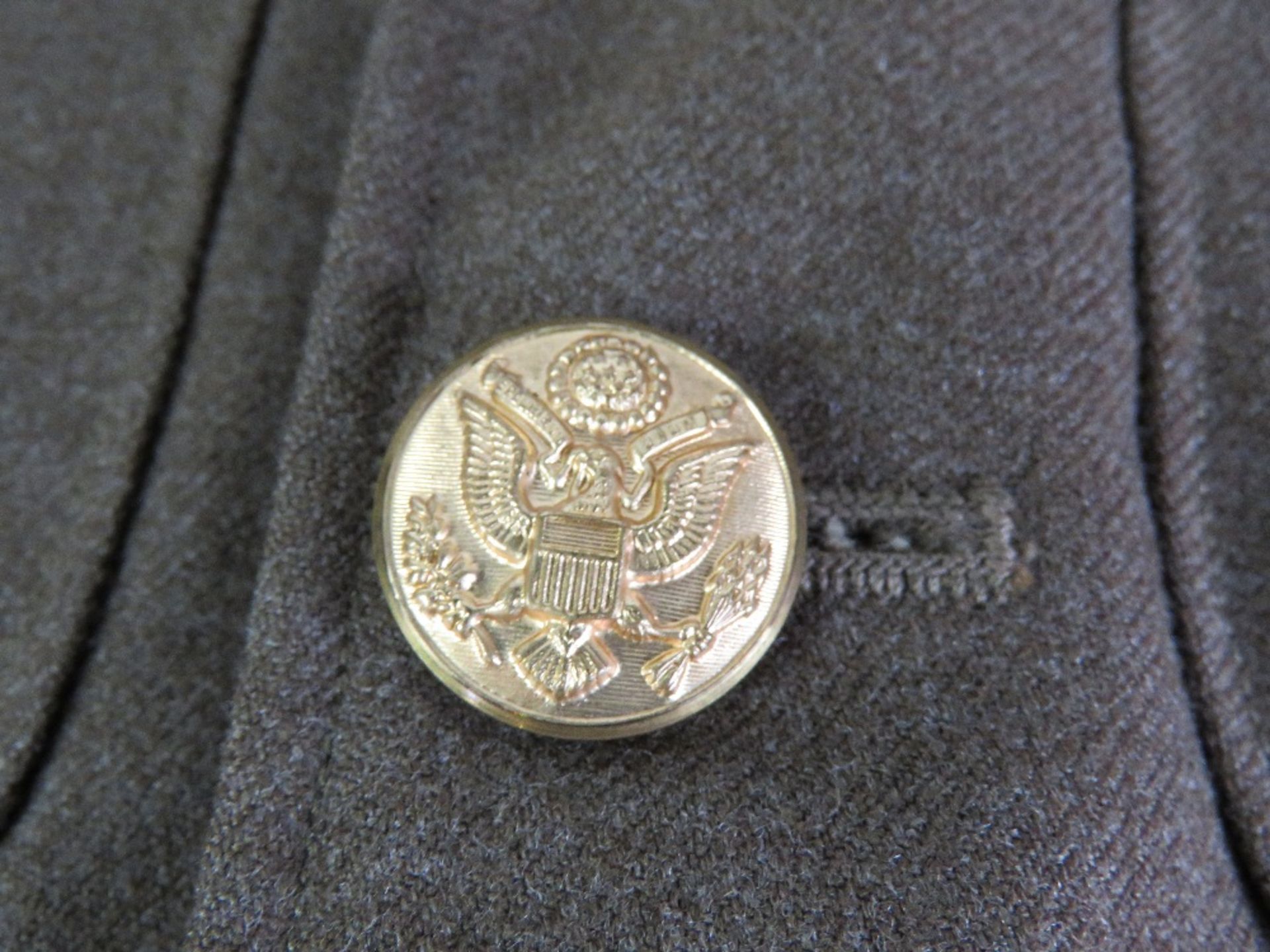 A WWII US Airborne tunic, having all buttons and numerous patches and badges. - Image 8 of 8