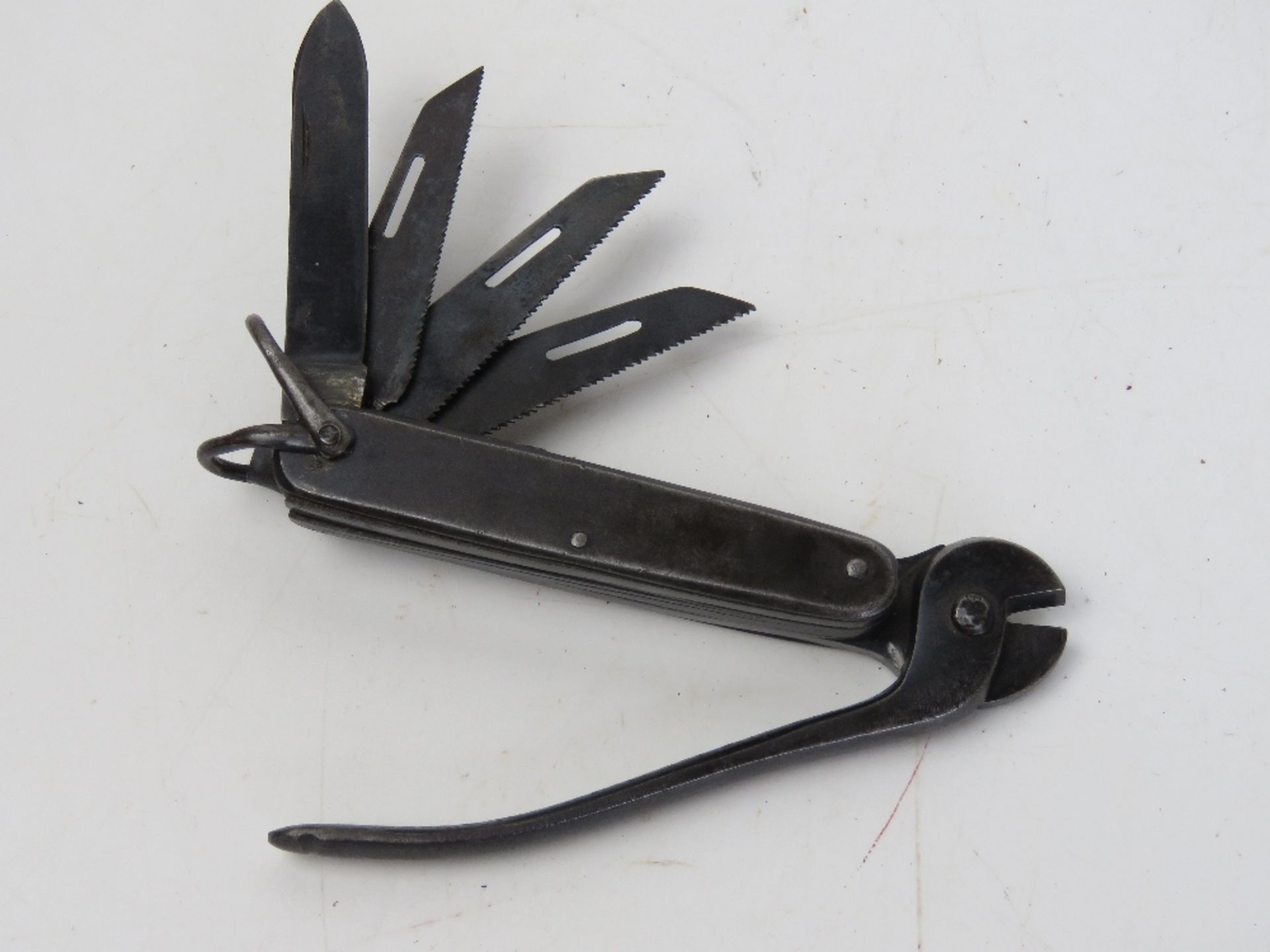 A WWII SOE multi tool, used by the SOE Operatives.