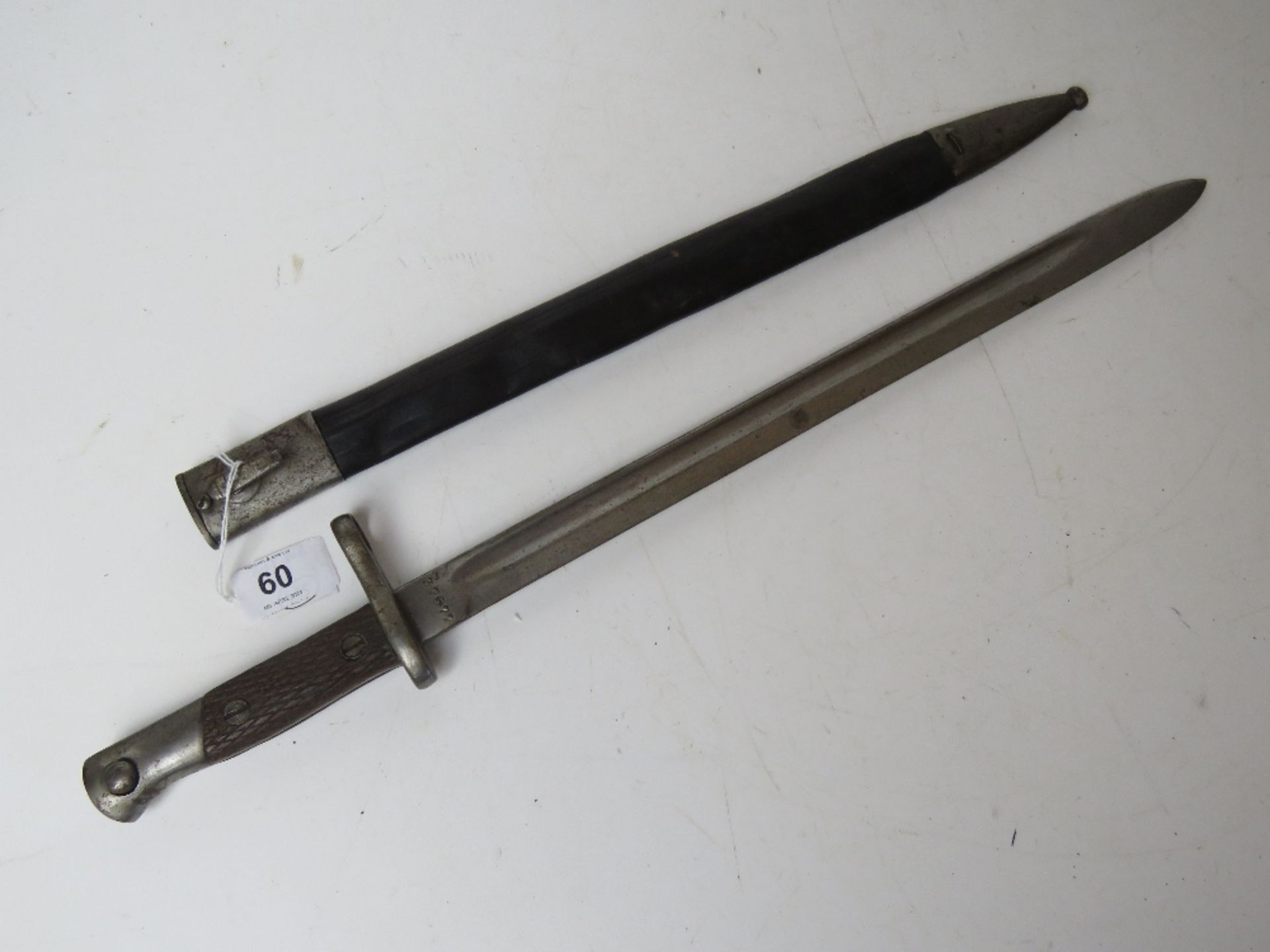 A WWII Brazilian Mauser model 1935 bayonet and scabbard, with serial number 37677 on the blade.