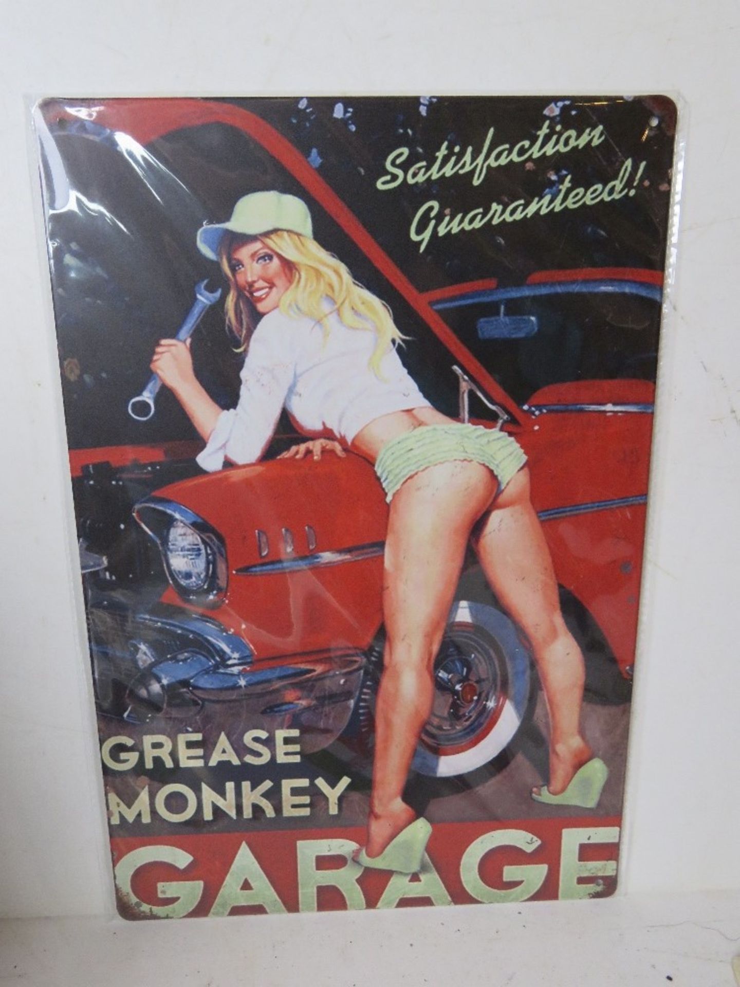 A contemporary metal garage Grease Monke