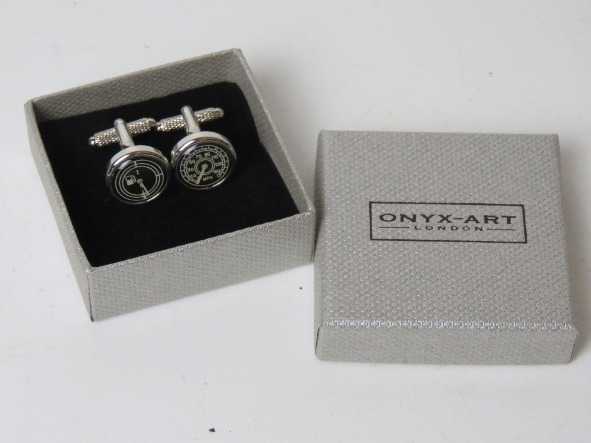 A pair of as new cufflinks in the form o