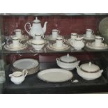 A Royal Doulton coffee and dinner service for eight, in Pavanne H5095, includes two tureens,