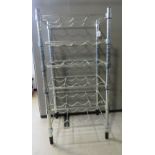 A chrome free standing IKEA OMAR wine rack approx. 46 x 35 x 92.