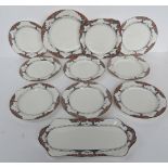 A Crown Ducal high tea service in orange tree pattern having eight plates,