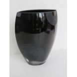 A contemporary black and clear art glass vase standing 25.5cm high.
