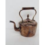 A copper kettle approx 28cm wide to spout.