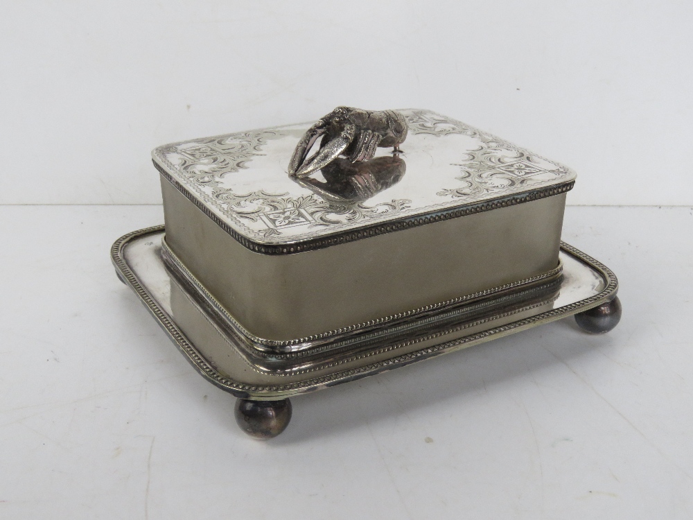 A delightful silver plated Mappin & Webb butter dish having lobster designed handle,