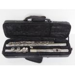 A Windsor flute in fitted case.